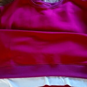 Rose color sweatshirt with side zippers
